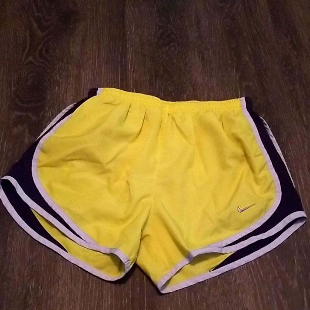 Black and yellow athletic shorts